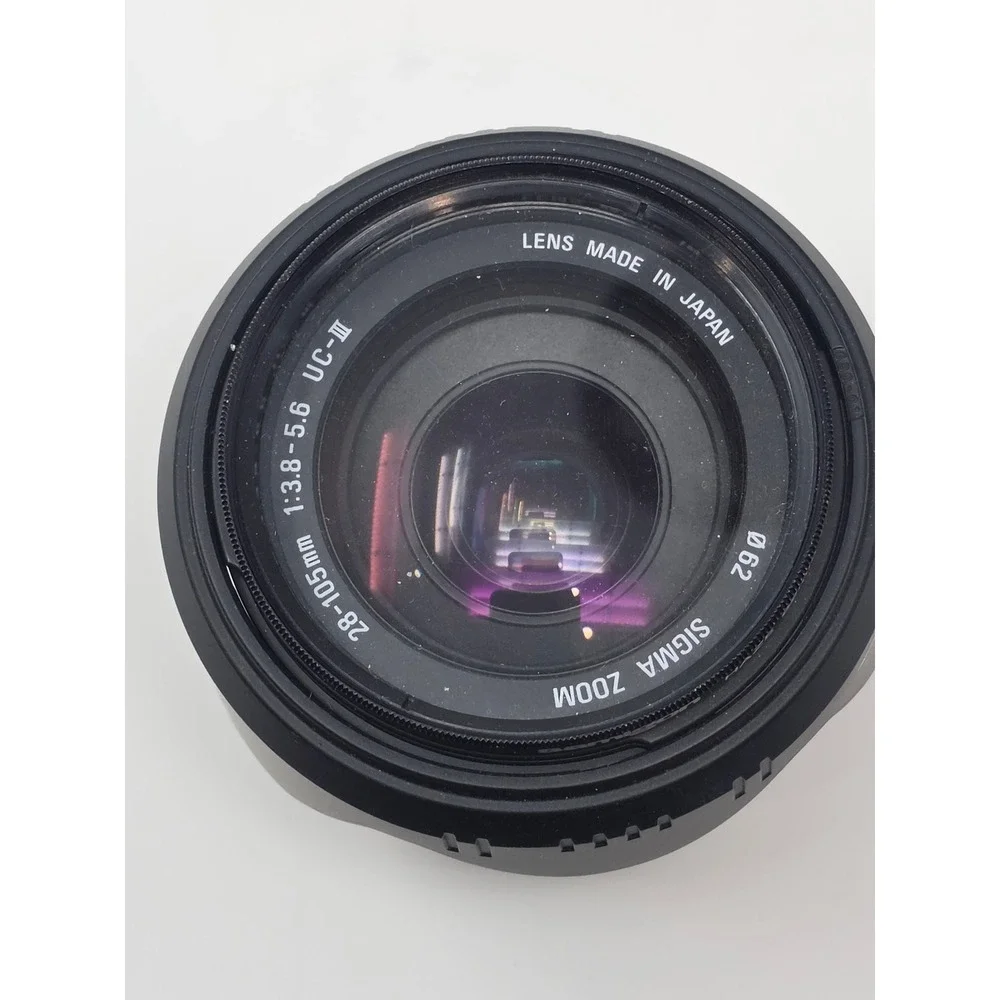 Nikon D3100 DSLR Camera Bundle 18-55mm 35mm 70-300mm Lenses Case Charger